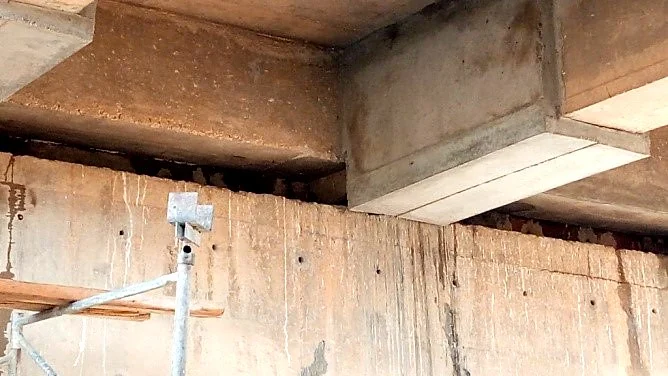 Chemisage en béton armé sous le tablier